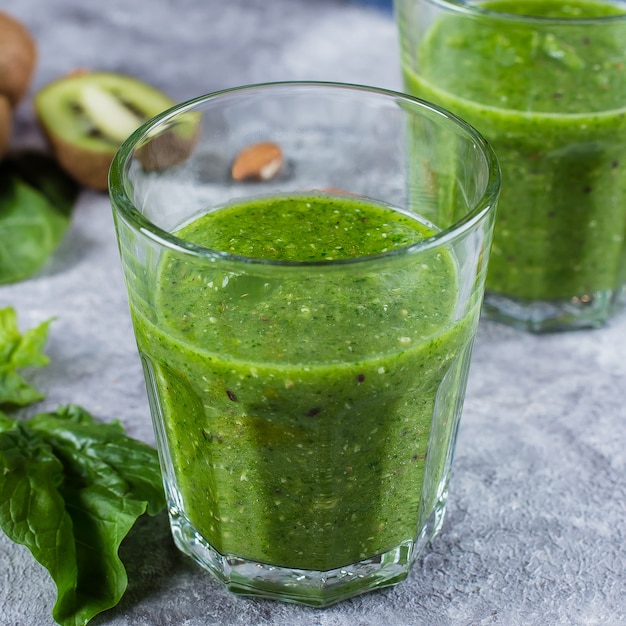 Close up of Two Glases with Blended Green Smoothie