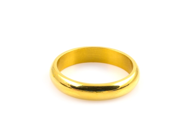 Close up of two gold rings for wedding isolated on white background