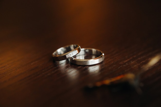 Close-up of two gold wedding rings for a wedding.