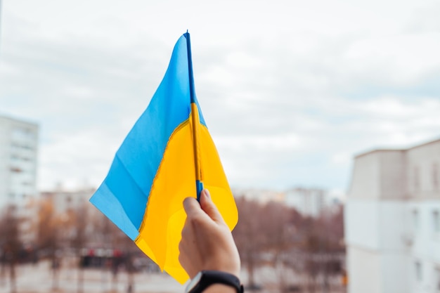 Close up of ukrainian flag during war with russia invasion in ukraine russian attack of ukraine