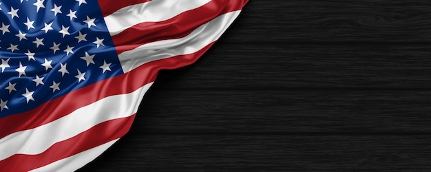 Close Up of United States of America flag on the black wooden background 3D render