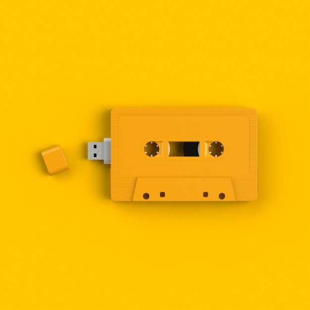 Close up of USB flash drive in vintage yellow audio tape cassette concept illustration iso