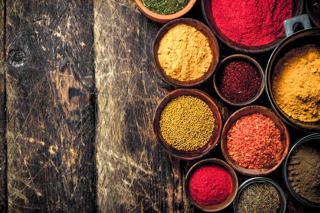 Close up on various ground spices and herbs