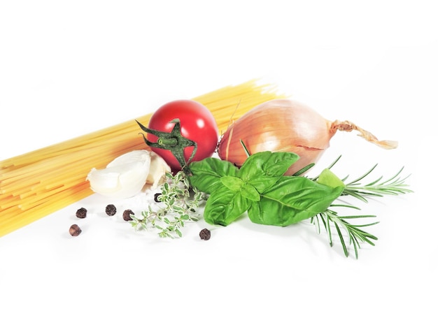 Photo close-up of vegetables in container against white background