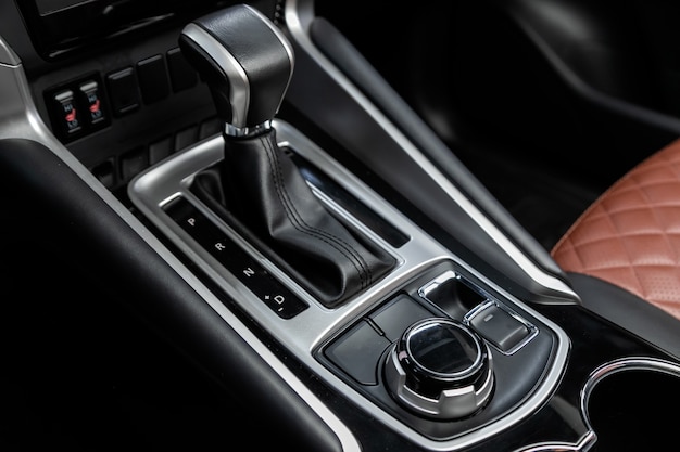 Close-up view of the automatic gearbox lever. Interior car,  automatic transmission gearshift stick