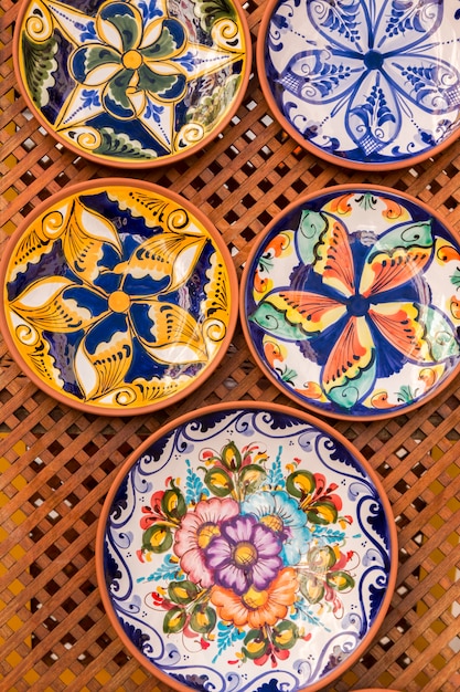 Close up view of beautiful hand painted dishes on a store.