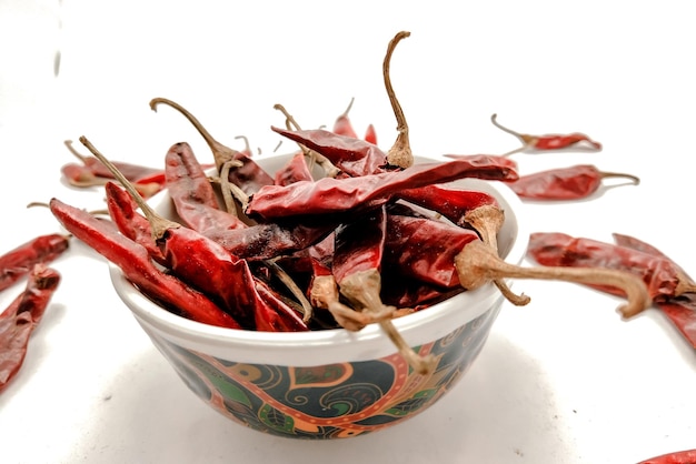 Close-up view of dried red chilli on a bowl