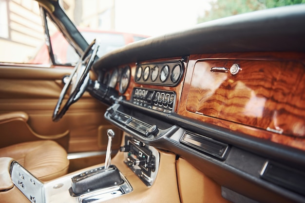 Close up view of front part of luxury old retro automobile.