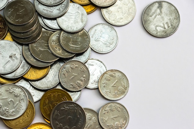 Close up view of indian rupees coins on white background.