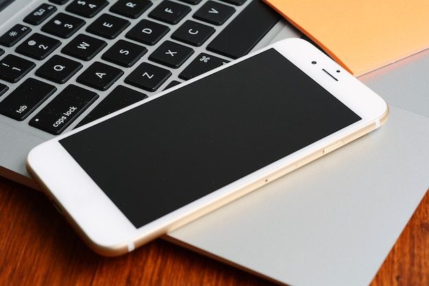 Close up view of keyboard and phone 