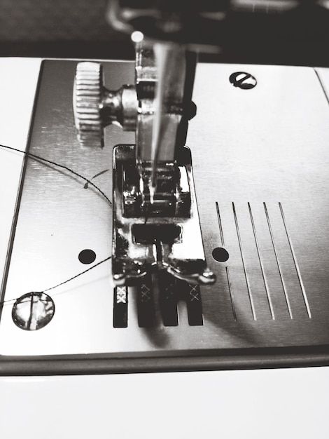 Photo close-up view of sawing machine