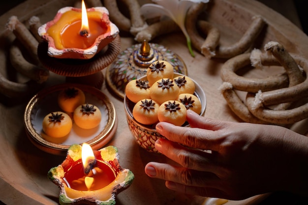 Close up view of several Thai traditional desserts served on porcelain in wooden tray