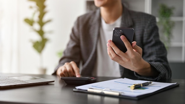 Close up view of Smart young businessman working in the office room