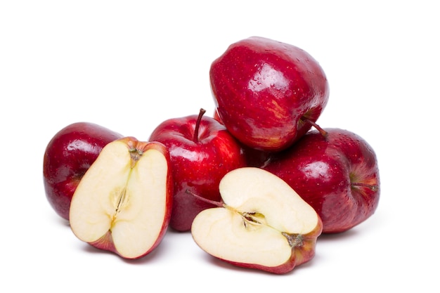 Close up view of some red apples isolated on a white background.