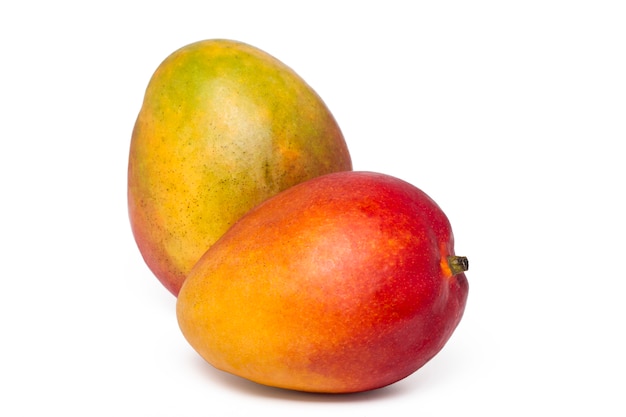 Close up view of tasty mango fruits isolated on a white background.