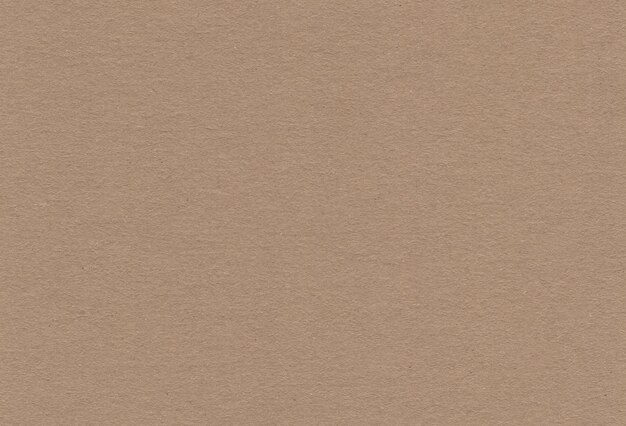 Close up view of textured brown coloured carton paper background Extra large highly detailed image