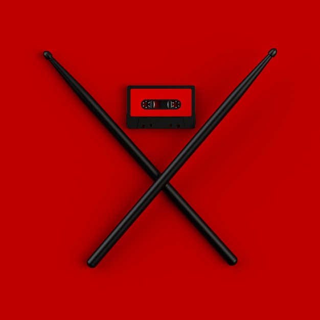 Close up of vintage audio tape cassette with drumsticks concept illustration on red backgr