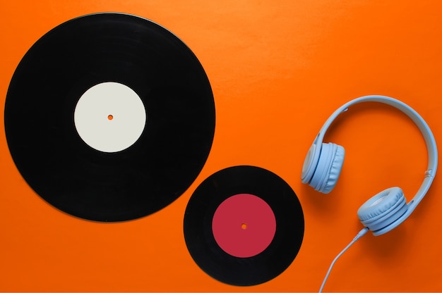 Close up on vinyl disc with headphones isolated