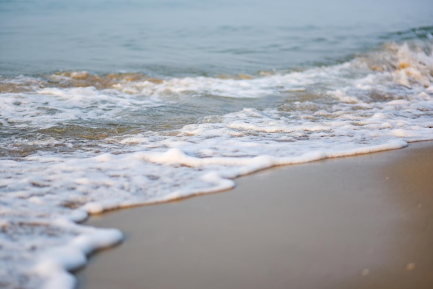 Close-up of waves rushing towards shore