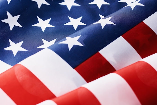 Close up of waving national usa american flag as a. Concept of Memorial or Independence Day or 4th of July