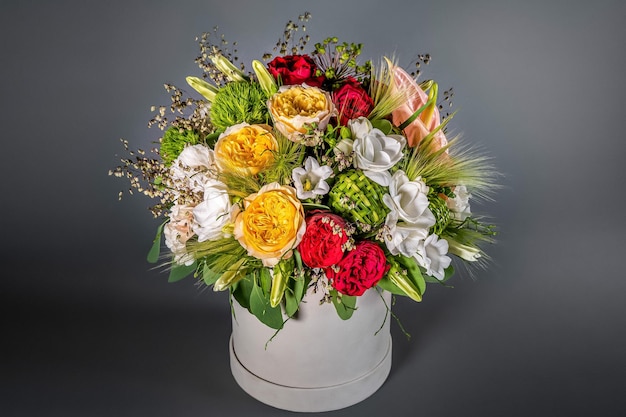 Close up wedding bouquet of flowers Isolated on a gray background Delicate bouquet in pastel colors Summer flowers