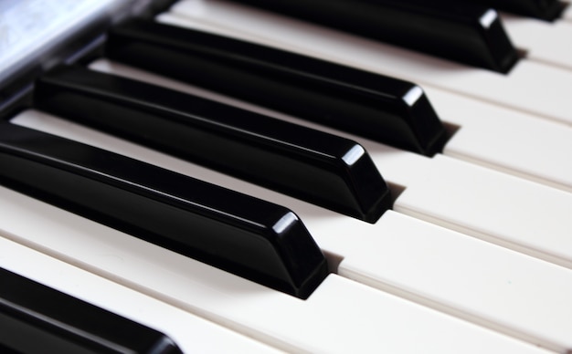 Close-up white and black keys of a synthesizer