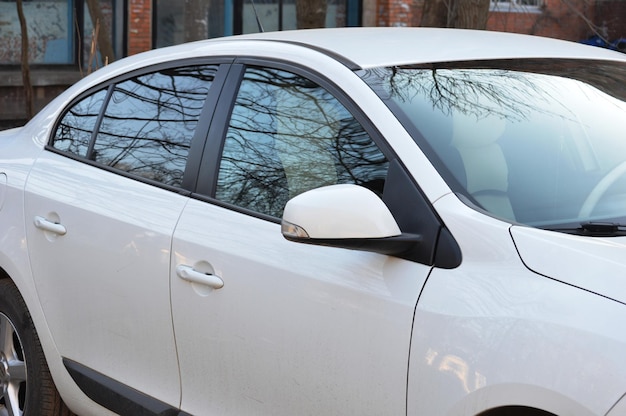 Close-up of white car window