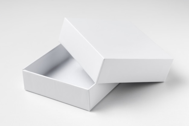 Close up white open cardboard gift box