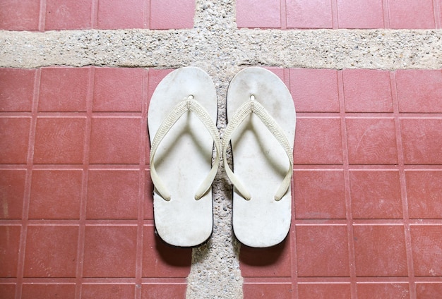 Close up white sandal on floor