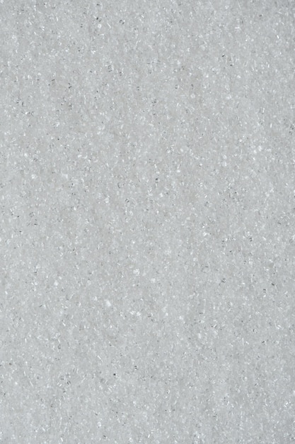 Photo a close up of a white textured wall with a few small drops of snow