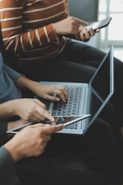 Close up of woman hand using credit card and laptop for payment and online shopping Online shopping payments digital banking Ecommerce concept