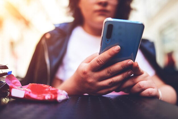 Close up of woman hands using mobile smartphone