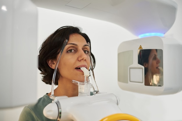 Close up of a woman head taking dental CT scan