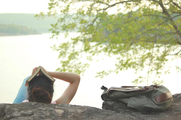 Close-up of woman relaxing outdoors