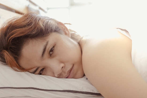 Close up of woman sleep on her white bed concept of sleepy