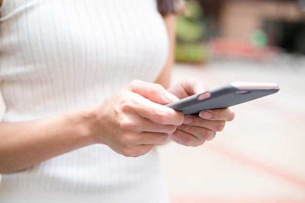 Close up of woman touch on smart phone