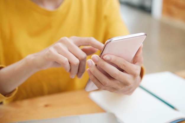 Close up of woman using mobile phone