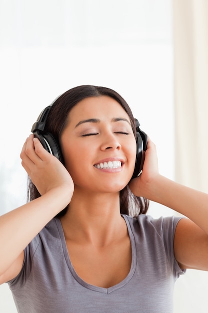 Close up of woman with earphones