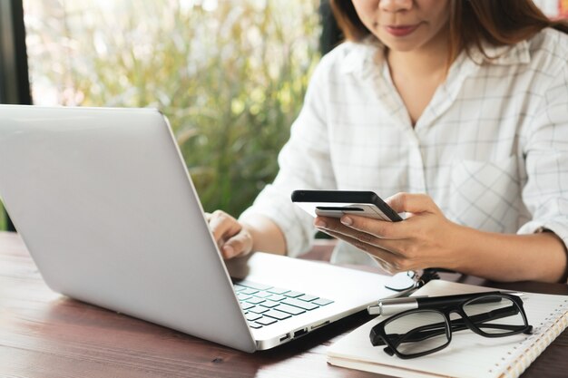 Close up of a woman working on a computer