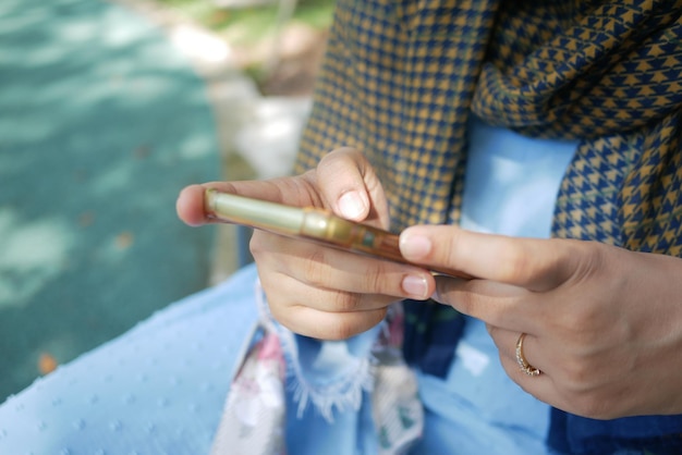 Close up of women hand holding smart phone