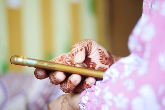 Close up of women hand holding smart phone