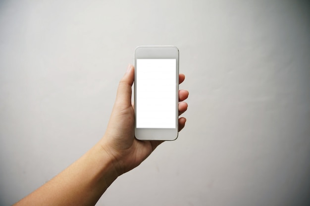 Close up of women's hands holding cell telephone blank copy space screen. smart phone with technology concept