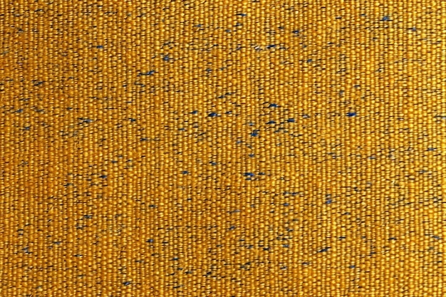 Close up of yellow and blue fabric texture background