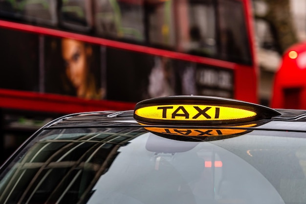 Close-up of yellow sign on car