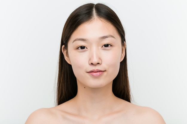 Close up of a young beautiful and natural asian woman