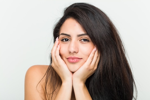 Close up of a young beautiful and natural hispanic woman