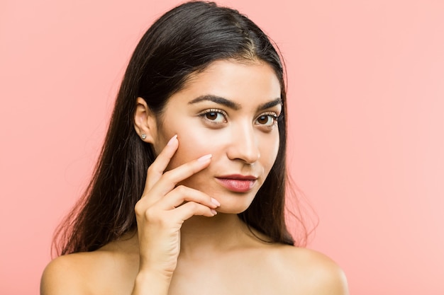 Close up of a young beauty and natural arab woman posing