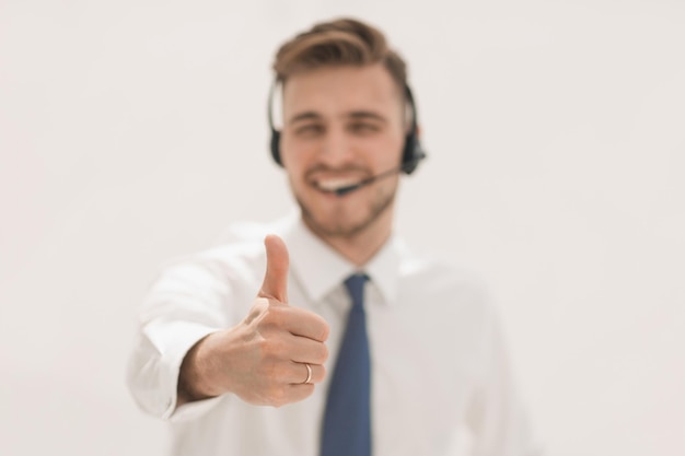 Close upemployee call center showing thumb upisolated on white