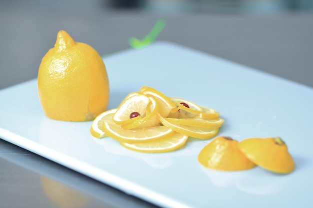 Close upslices of lemon on the cutting board