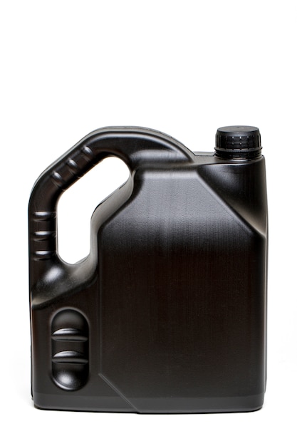 Close view of a black plastic container of car oil isolated on a white background.